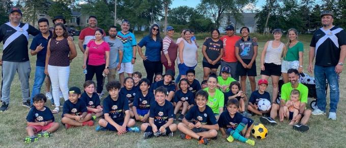 Soccer camp participants and adults, photo provided by Esperanza United